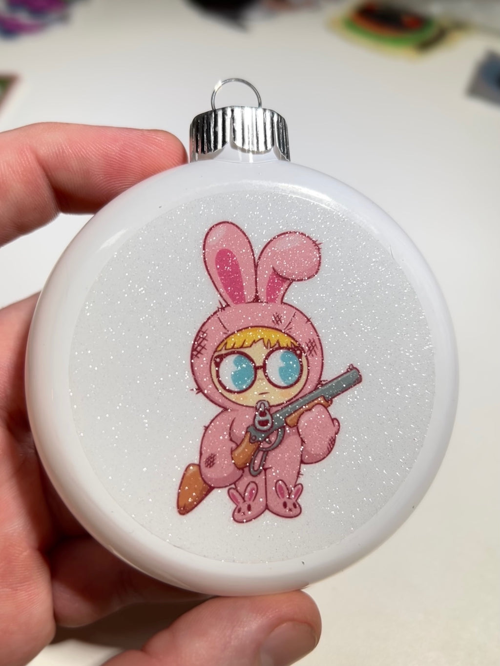 "Yule Shoot Your Eye Out" Christmas ornament -@andrewknzi