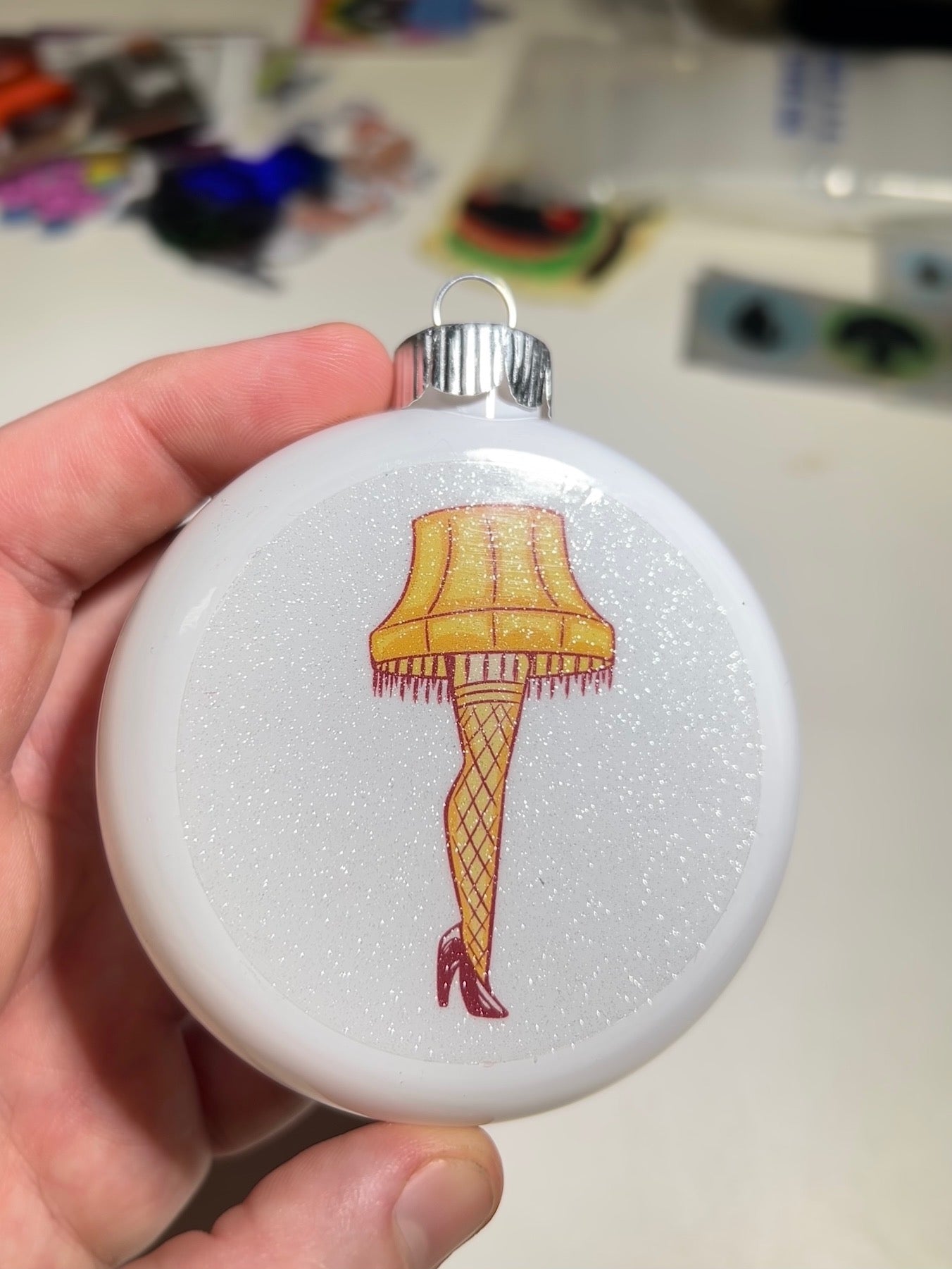 "Yule Shoot Your Eye Out" Christmas ornament -@andrewknzi